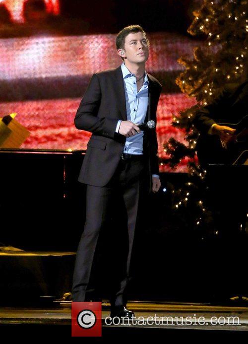 Scotty McCreery performing at the 2012CMA Country Christmas at