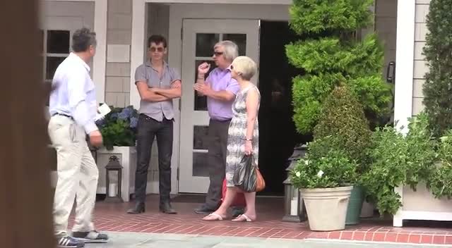Alex Turner From Arctic Monkeys And His Parents Wait In The Sun To Be  Picked Up In A Car | Alex Turner Video Video | Contactmusic.com