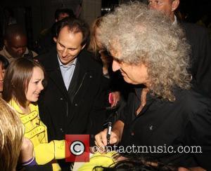 Brian May and a fan Freddie For A Day held at The Savoy - Arrivals. London, England - 05.09.11