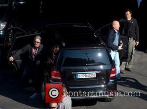 Bruce Willis gets out of a car on the film set of 'A Good Day to Die Hard' Hungary, Budapest...